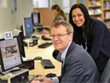 Trafford Executive Councillor Alex Williams (left) with the council's ICT Project Manager Nasrin Fazal